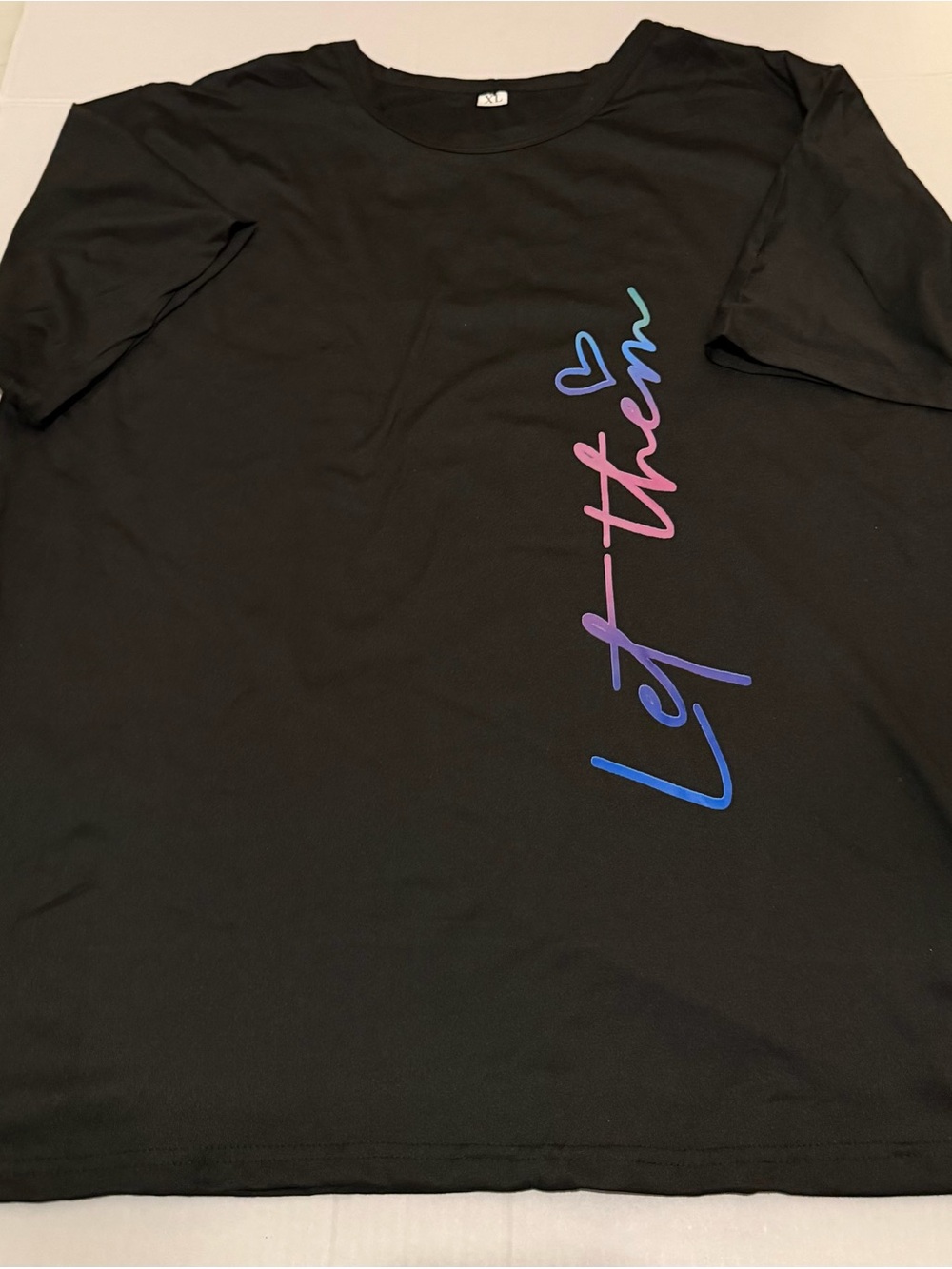 I31 XL Black Woman’s Graphic Tee with Multicolor Script “Let them”